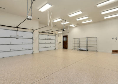 a two car garage with a tan epoxy coating