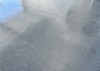 a shiny epoxy floor with flakes